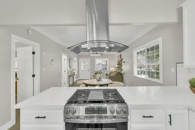 a view of a chair and table in the balcony