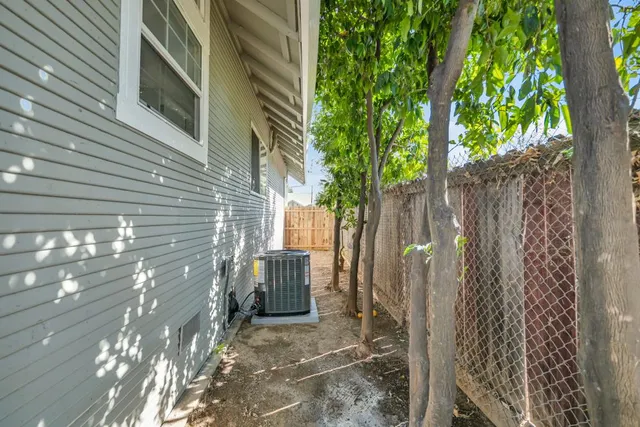 a bathroom with a shower a toilet and a sink