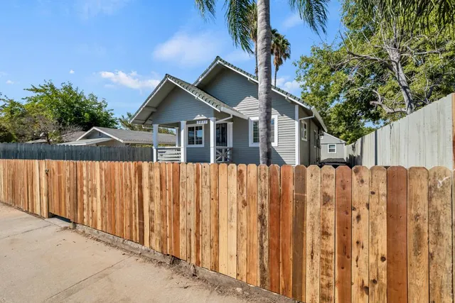 a view of a house with wooden stairs