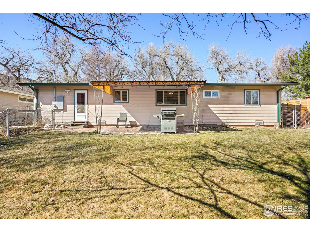 3120 Jefferson Street Boulder, CO 80304 - Photo 20 of 23 front view of a house with a yard