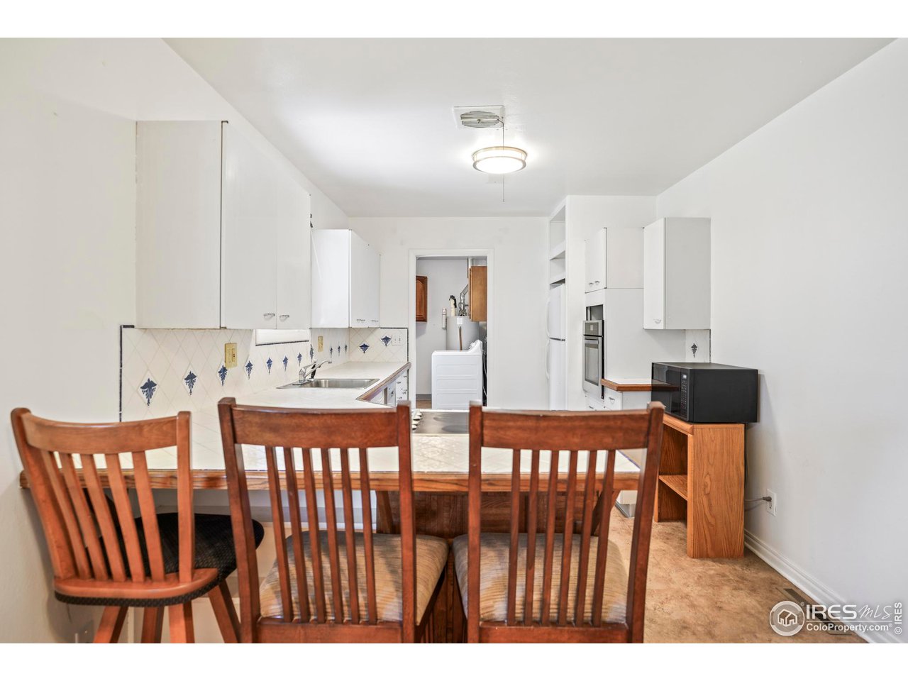 3120 Jefferson Street Boulder, CO 80304 - Photo 6 of 23 a view of kitchen with dining area