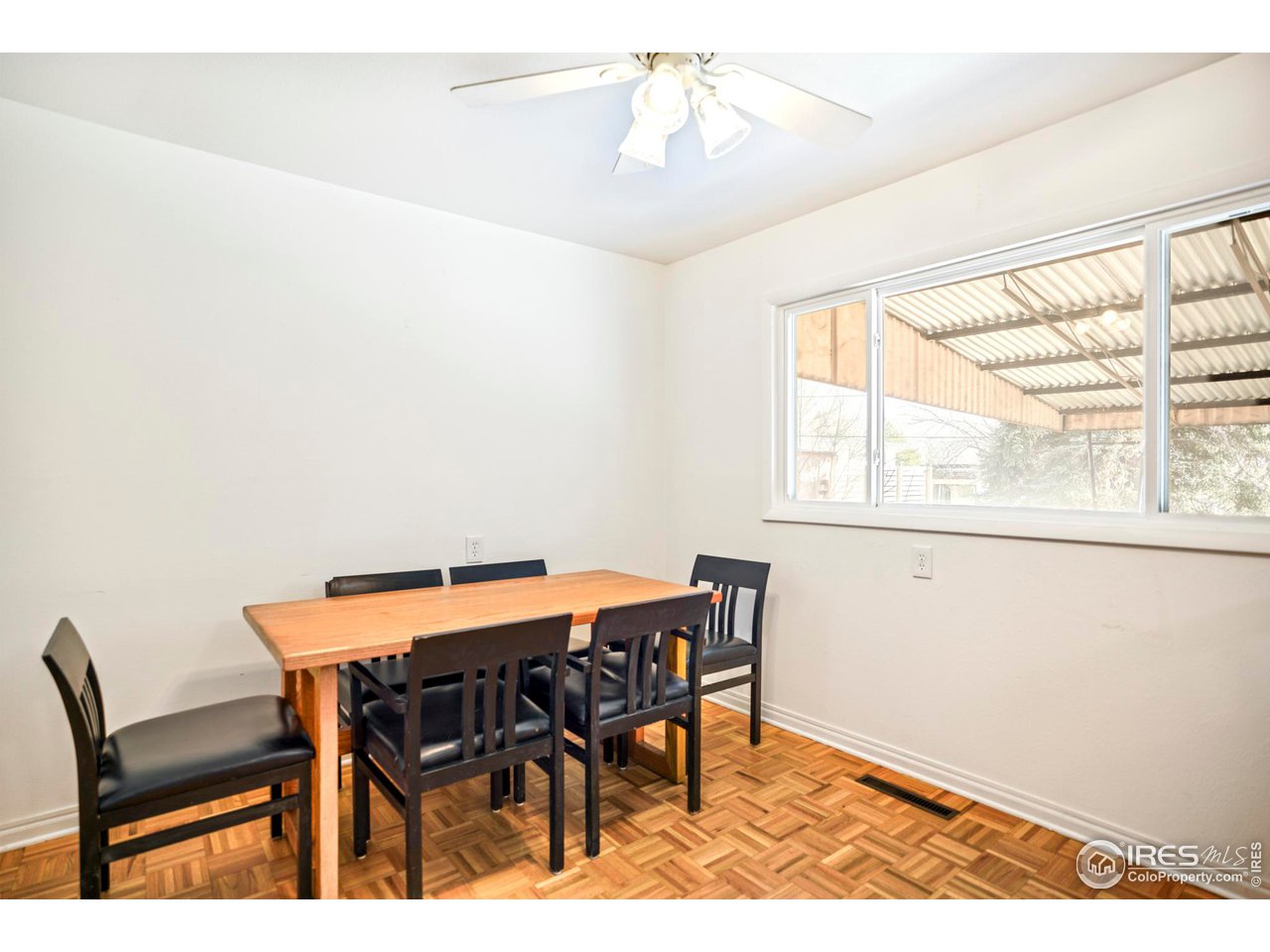 3120 Jefferson Street Boulder, CO 80304 - Photo 9 of 23 a view of a dining room with furniture and wooden floor