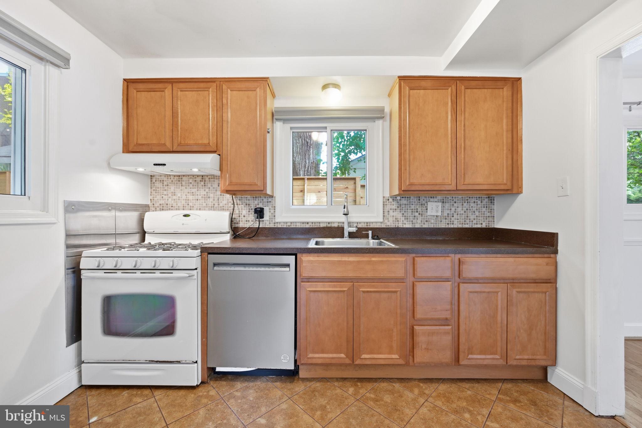 2204 Prichard Road Silver Spring, MD 20902 - Photo 9 of 28 Kitchen with newer dishwasher and fridge