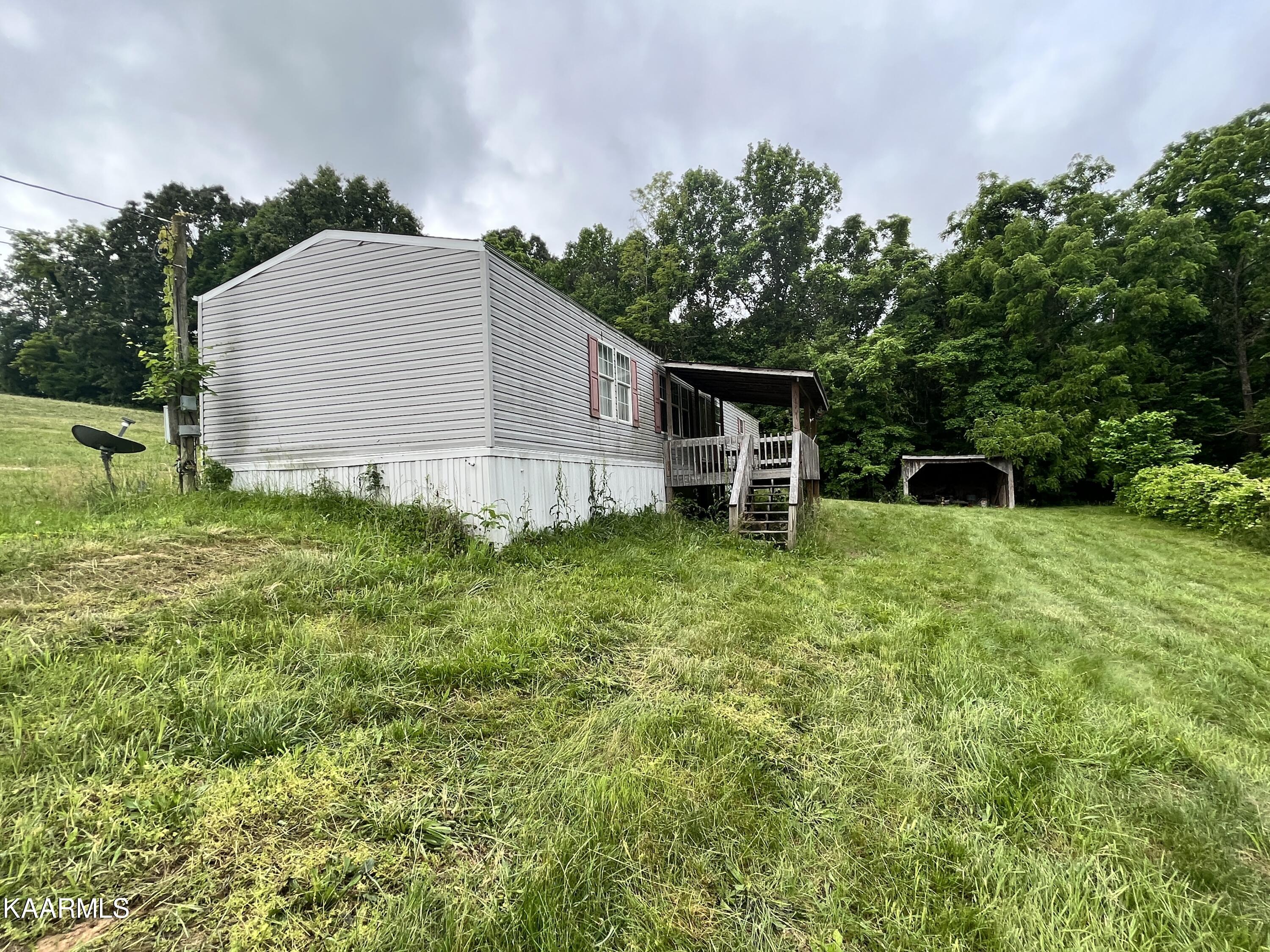 497 Wallace Road Luttrell, TN 37779 - Photo 4 of 32 3ABB923E-BDE2-444C-8021-920A43D01586