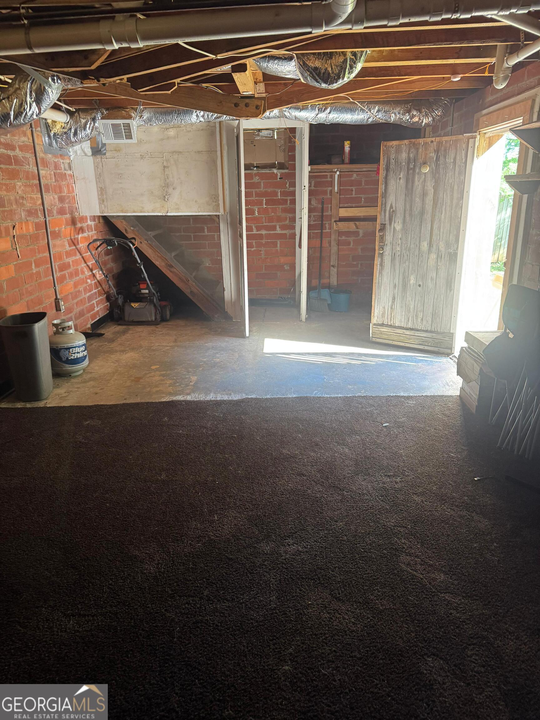 609 West Main Street Thomaston, GA 30286 - Photo 25 of 27 a view of a room with wooden walls