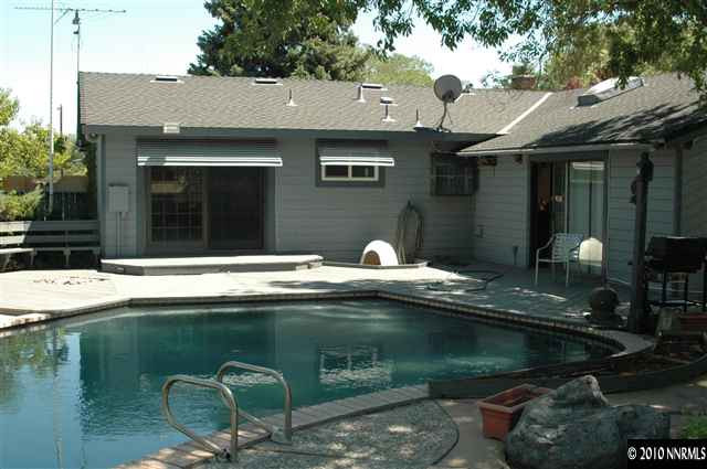 50 Butte Place Reno, NV 89503 - Photo 3 of 9 a view of a house with swimming pool