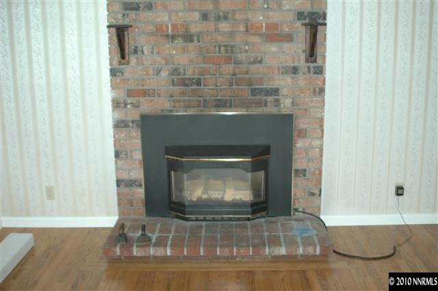 50 Butte Place Reno, NV 89503 - Photo 5 of 9 a living room with a fireplace