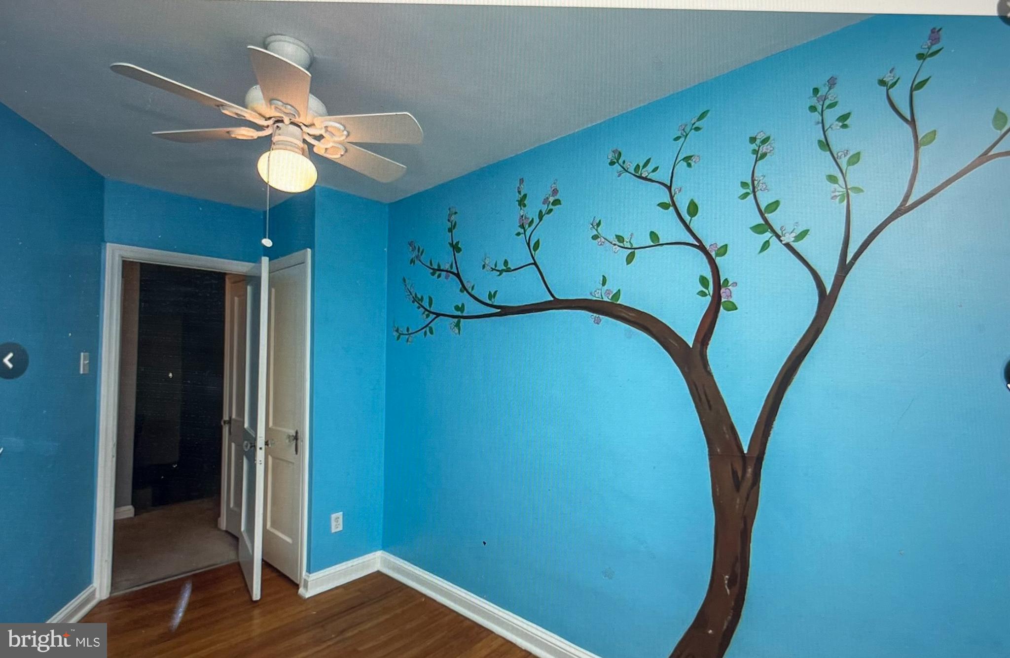 738 Eaton Road Drexel Hill, PA 19026 - Photo 12 of 16 a view of a room with wooden floor and fan