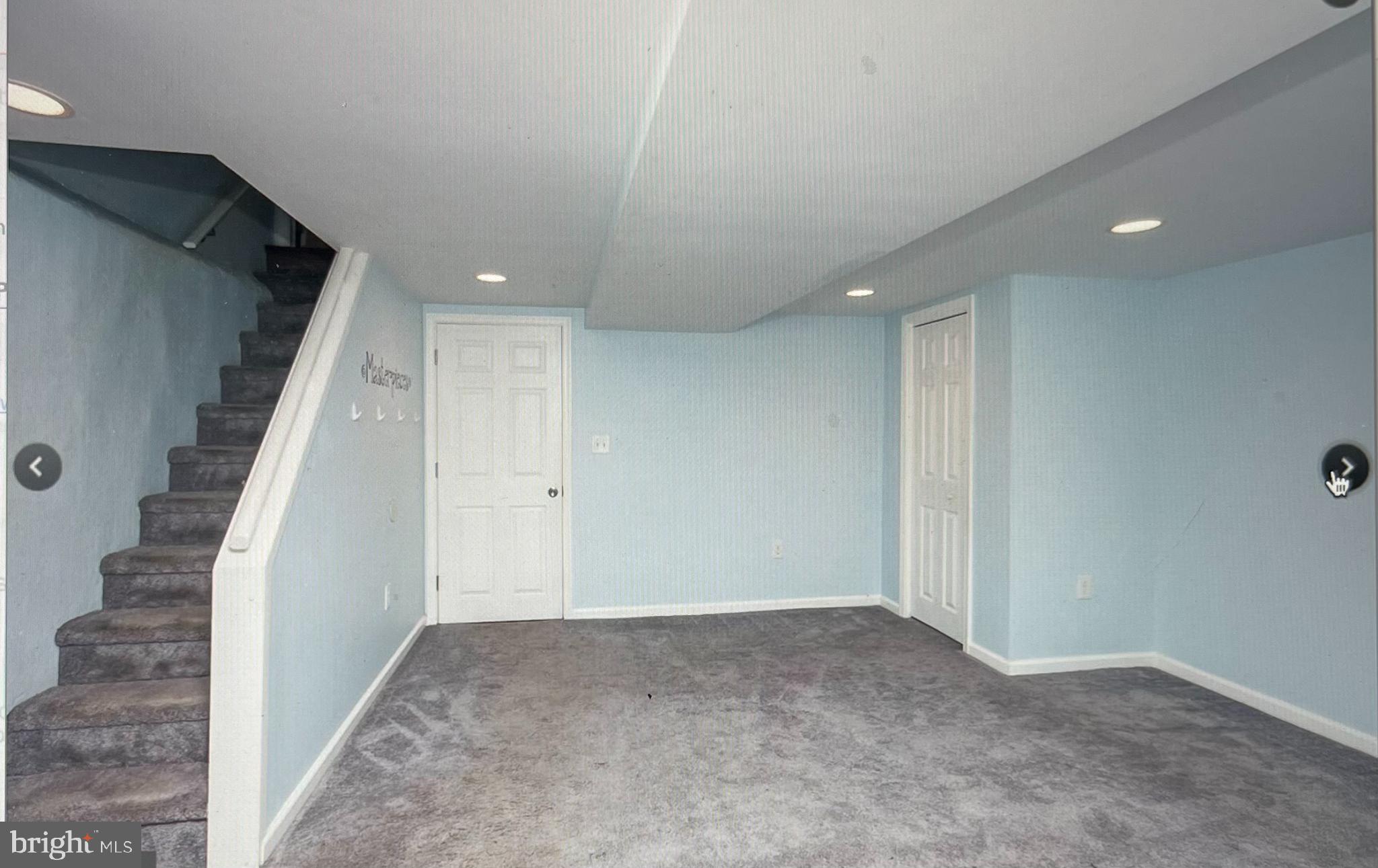 738 Eaton Road Drexel Hill, PA 19026 - Photo 13 of 16 a view of a hall with stairs