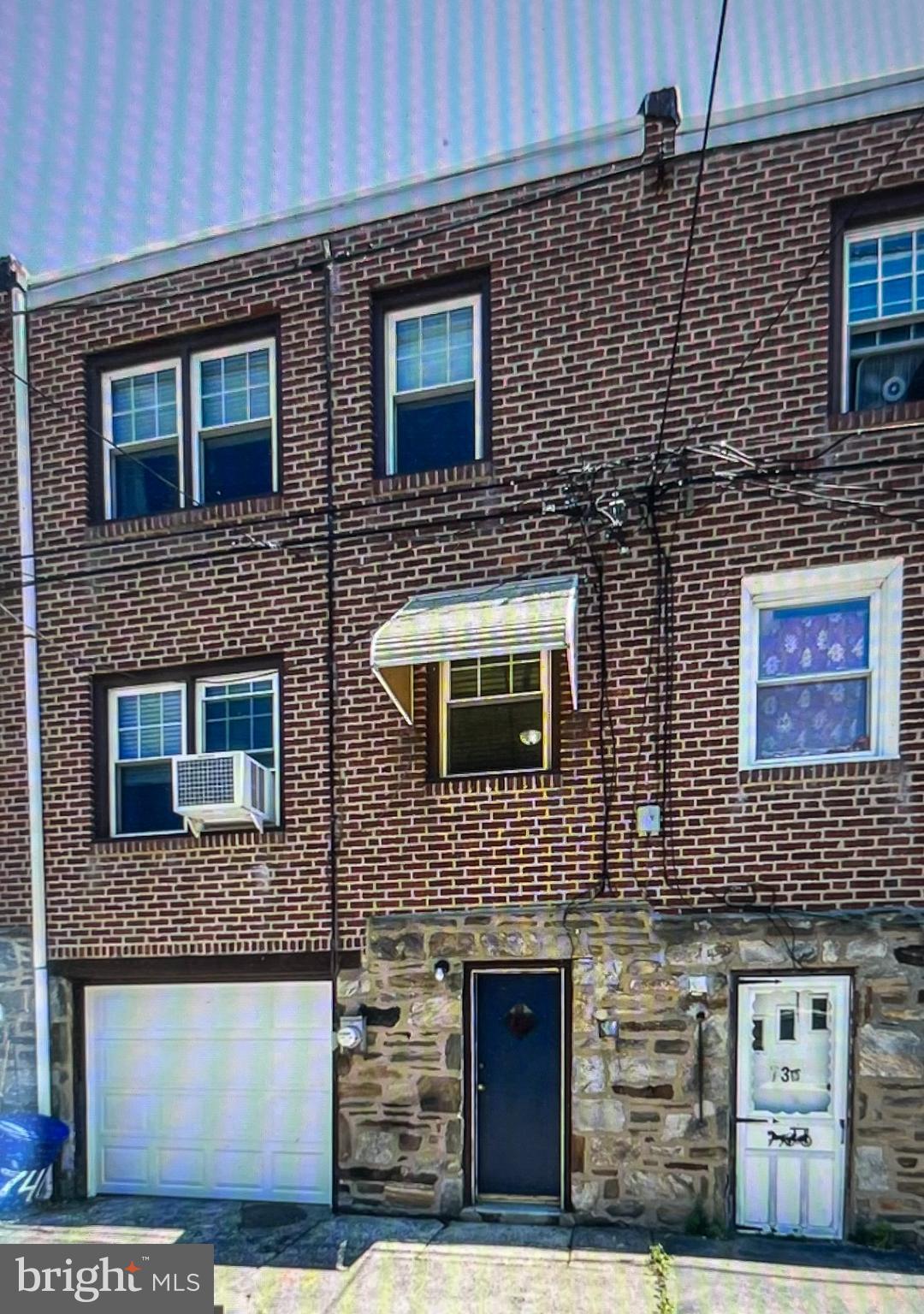 738 Eaton Road Drexel Hill, PA 19026 - Photo 16 of 16 a building view with a couple of windows