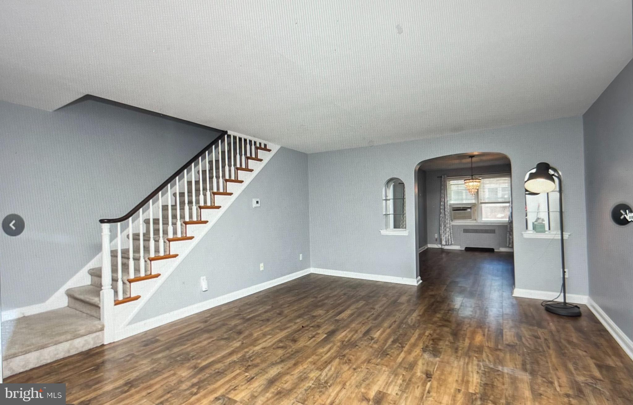 738 Eaton Road Drexel Hill, PA 19026 - Photo 2 of 16 a view of empty room with wooden floor and fan