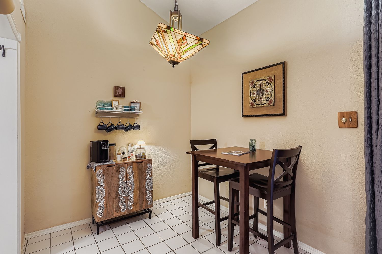 500 Hesters Crossing Road, Unit 310 Round Rock, TX 78681 - Photo 5 of 28 a view of a dining room with furniture and chandelier