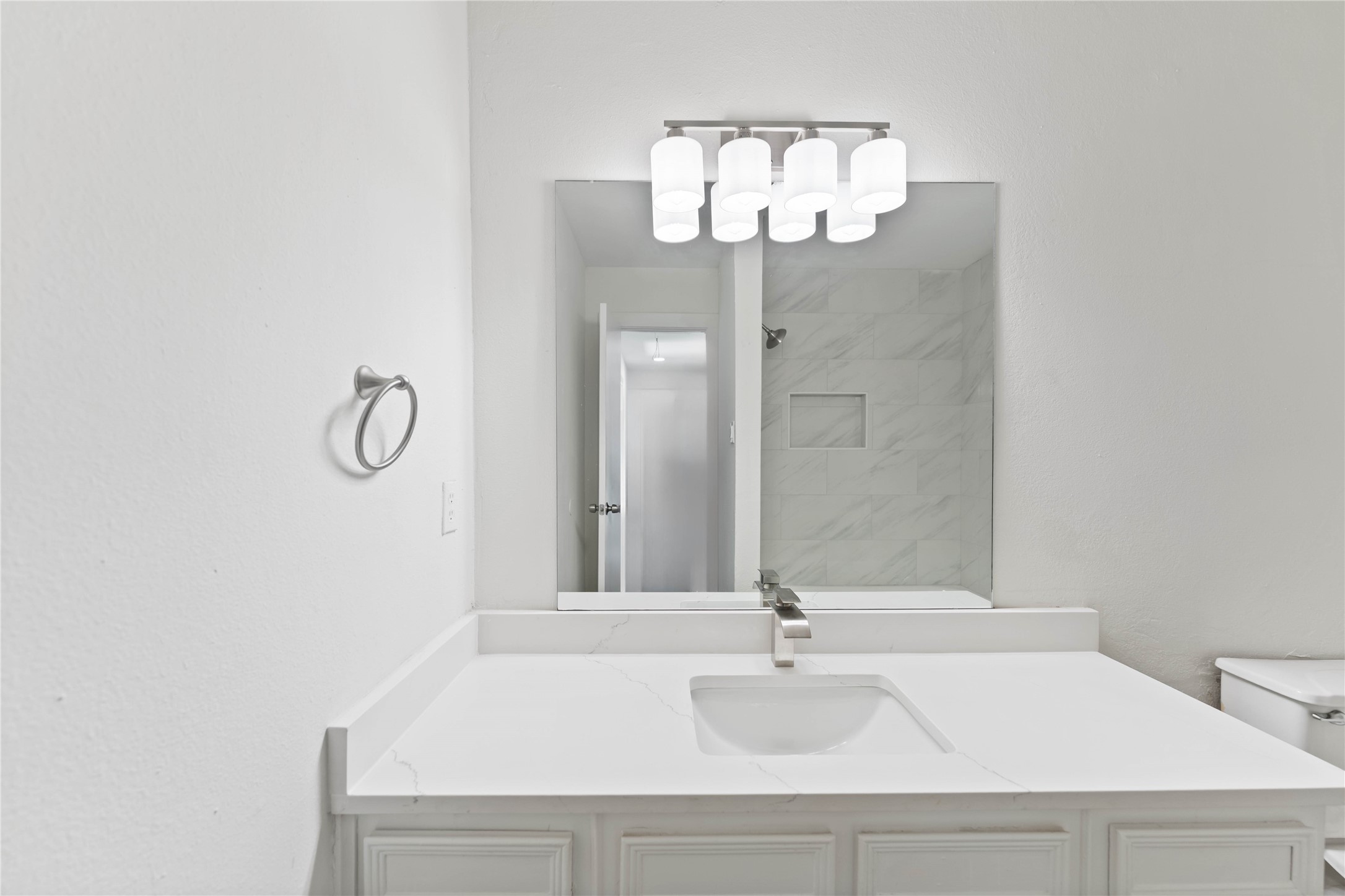 23122 Whispering Willow Drive Spring, TX 77373 - Photo 13 of 16 a bathroom with a sink and a mirror