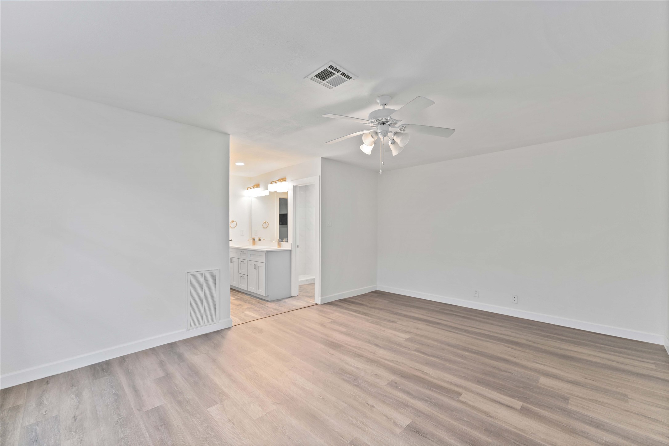 23122 Whispering Willow Drive Spring, TX 77373 - Photo 8 of 16 wooden floor in an empty room
