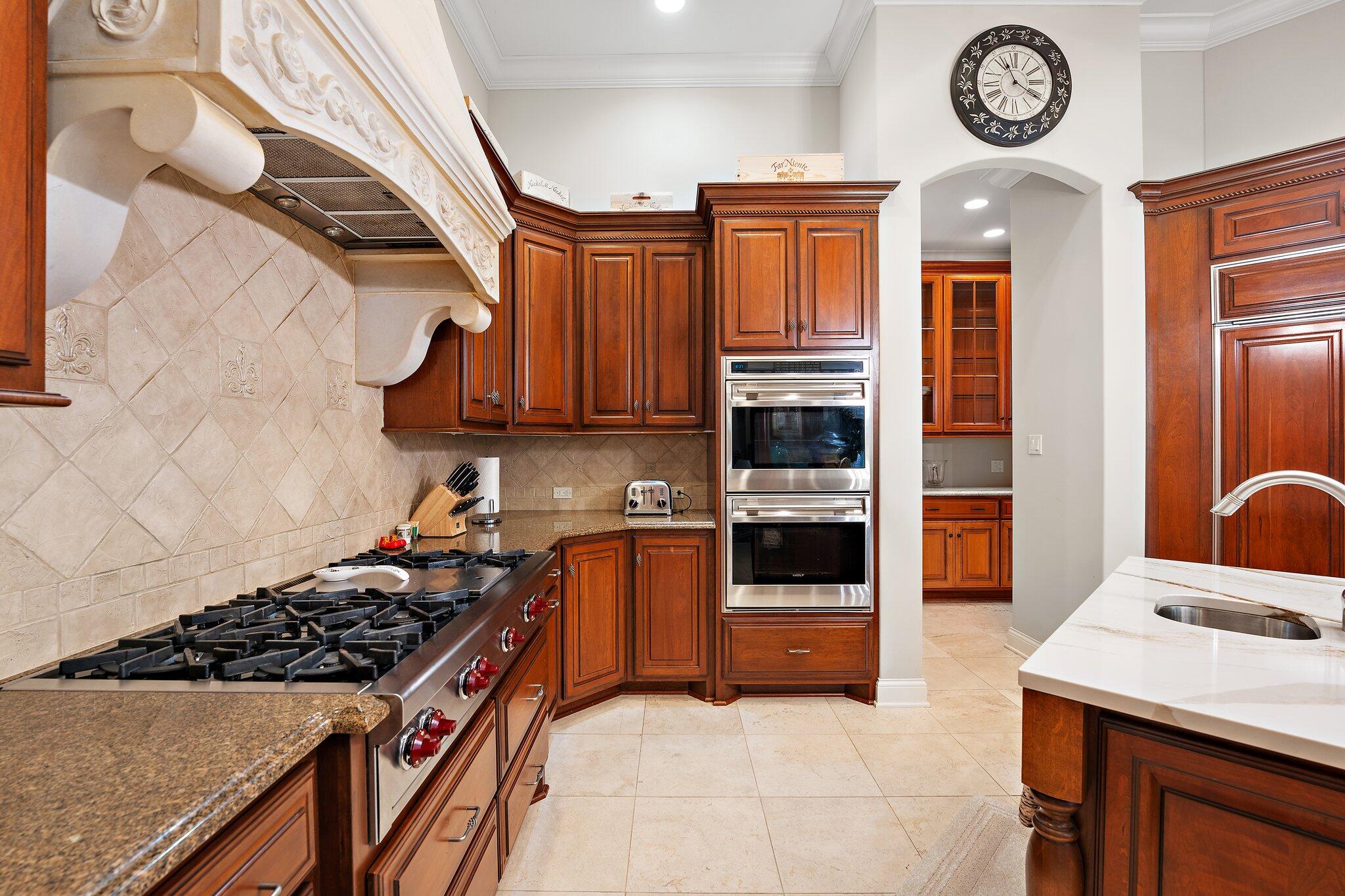 1191 Churchill Lane Crown Point, IN 46307 - Photo 21 of 80 a kitchen with stainless steel appliances granite countertop a stove and a refrigerator