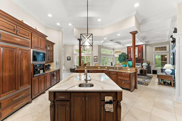 a bathroom with a double vanity sink mirror and shower