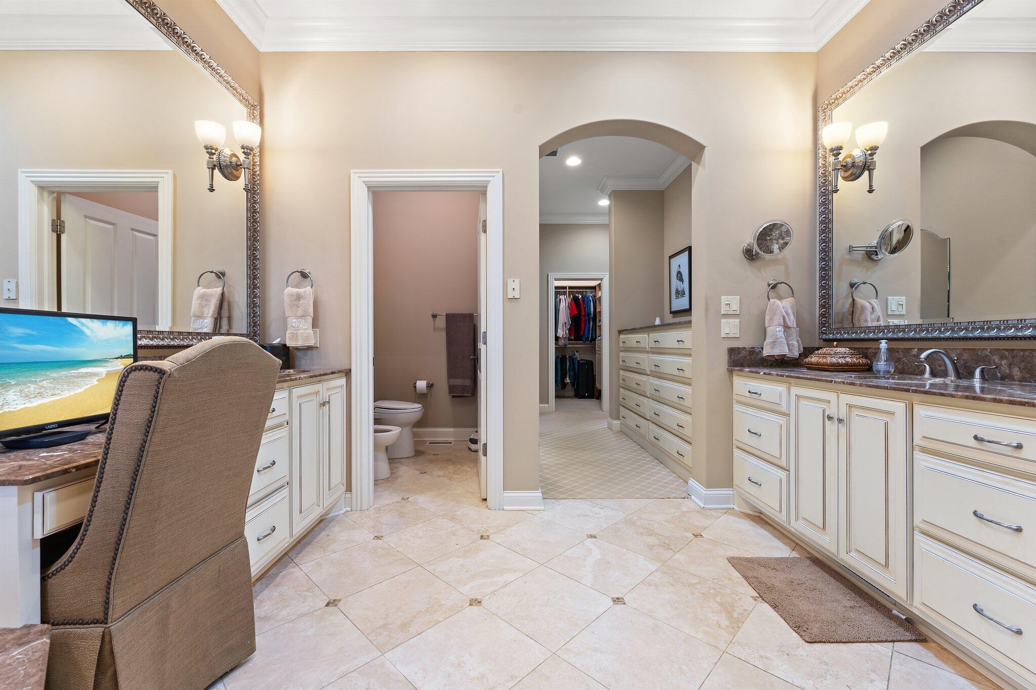 1191 Churchill Lane Crown Point, IN 46307 - Photo 35 of 80 a spacious bathroom with a double vanity sink and a mirror