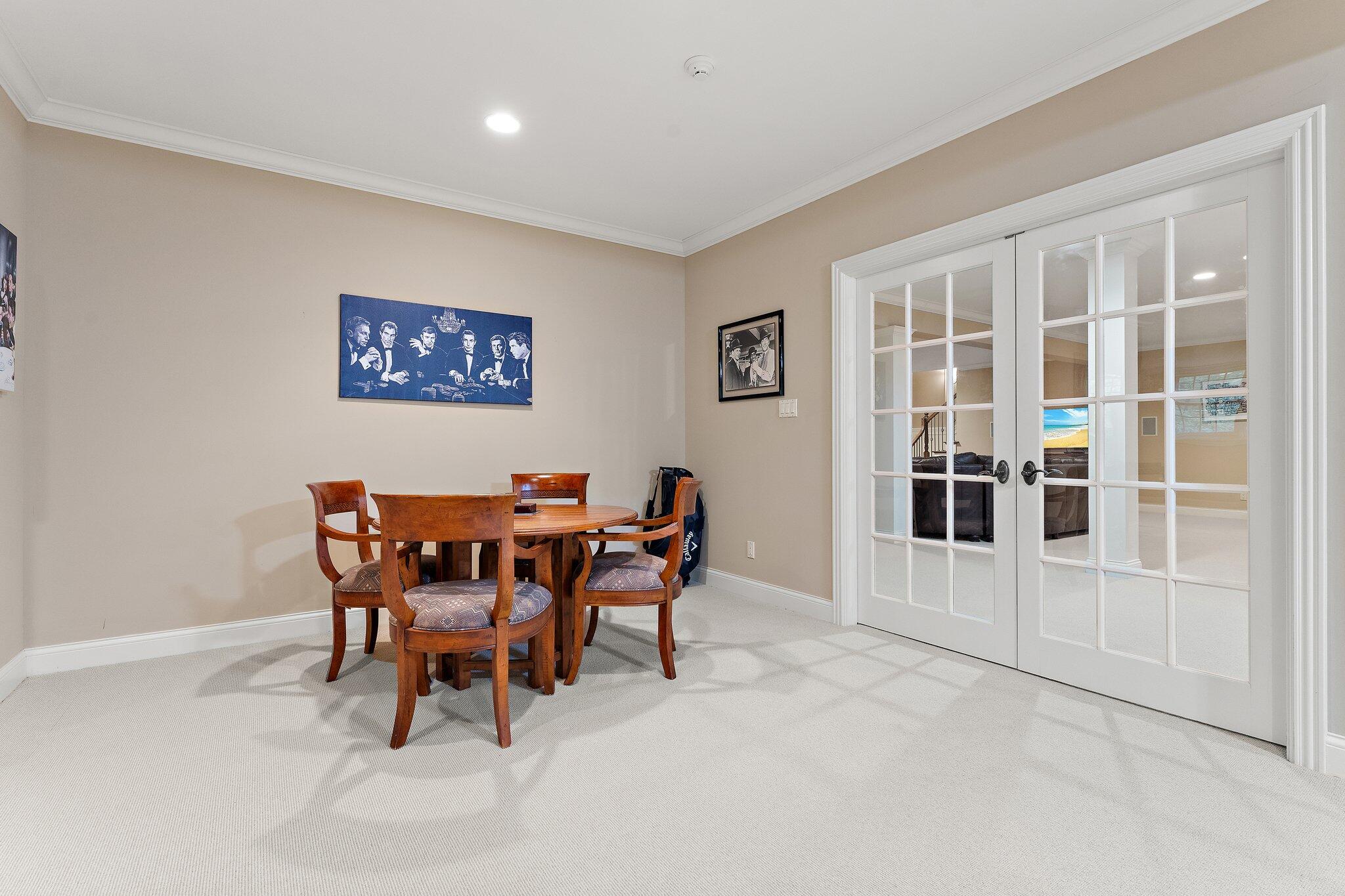 1191 Churchill Lane Crown Point, IN 46307 - Photo 56 of 80 a view of a dining room with furniture and chandelier