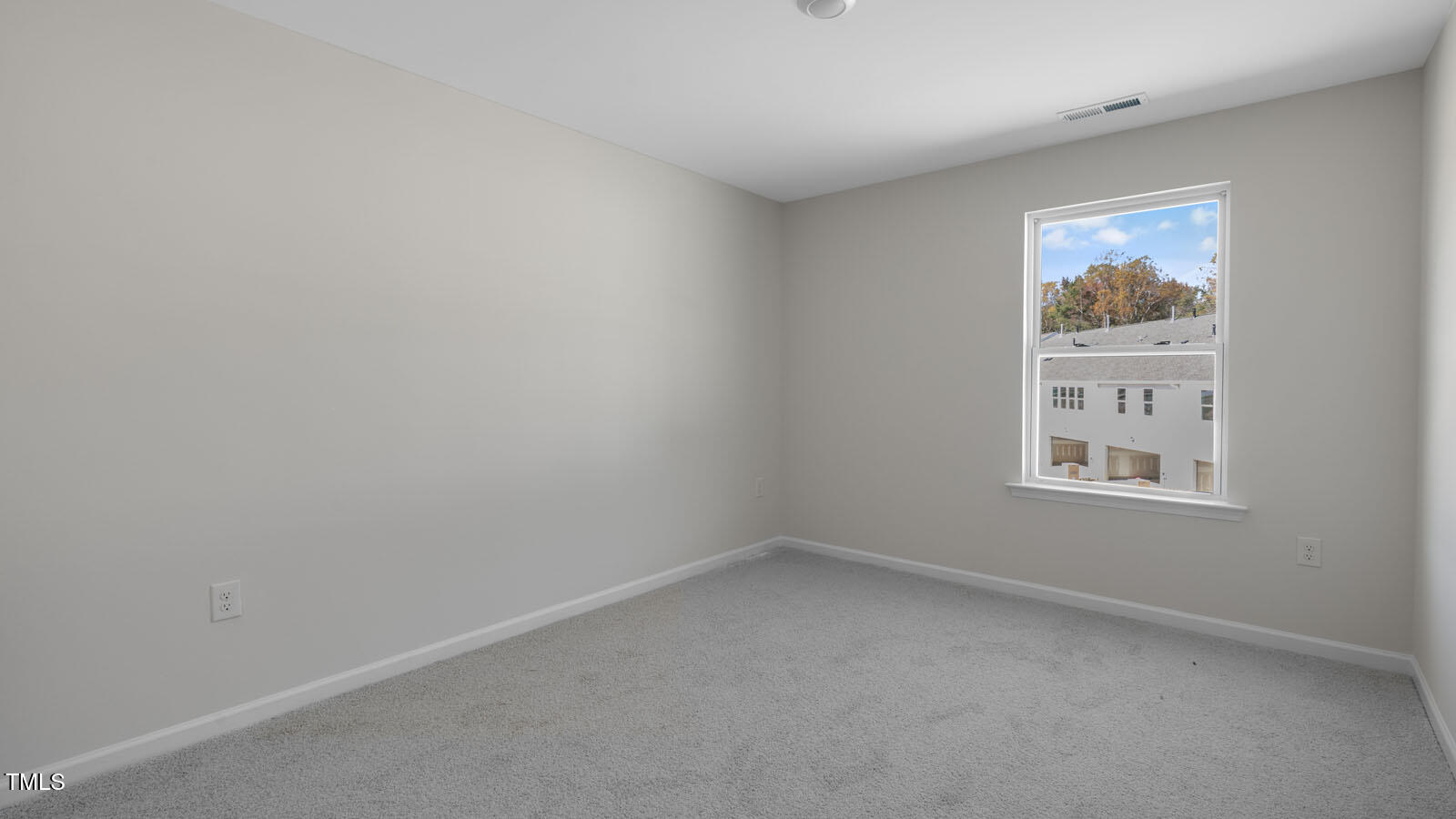 797 Old Tarboro Road Wendell, NC 27591 - Photo 15 of 32 a view of an empty room with a window