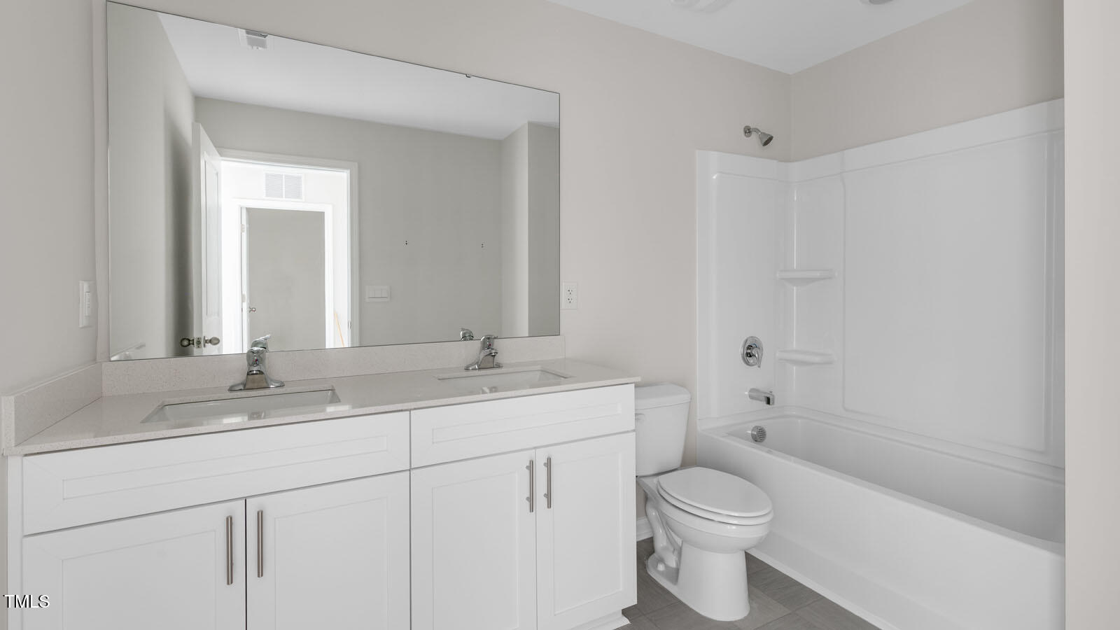 797 Old Tarboro Road Wendell, NC 27591 - Photo 16 of 32 a bathroom with a sink a toilet and shower
