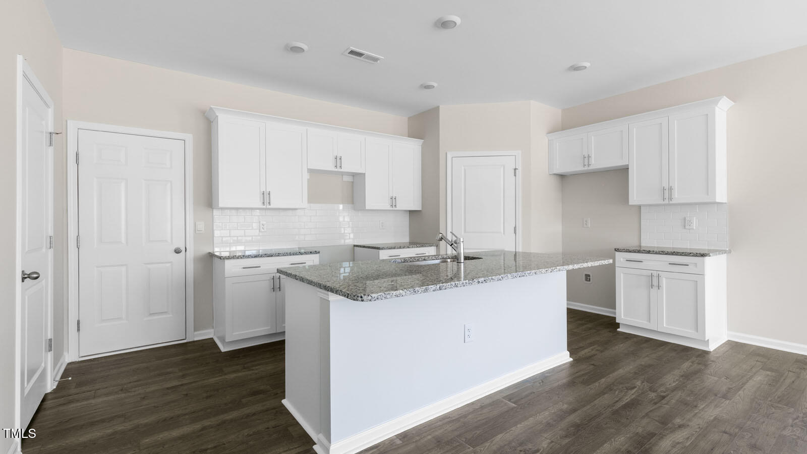 797 Old Tarboro Road Wendell, NC 27591 - Photo 3 of 32 a kitchen with a sink cabinets stainless steel appliances and a window