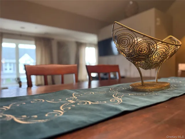 a view of a hall with furniture