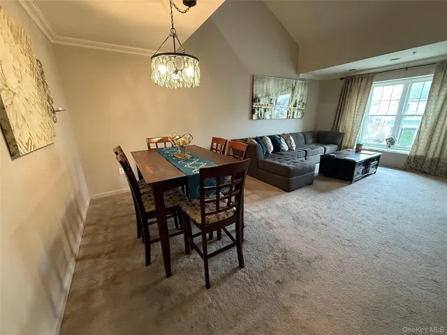 a view of a livingroom and dining room