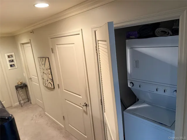 a utility room with a sink dryer and washer