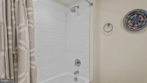 a view of a livingroom with furniture and wooden floor