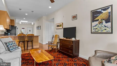 a view of a storage and utility room with washer and dryer