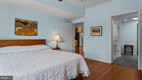 a kitchen with stainless steel appliances granite countertop a sink and a wooden cabinets