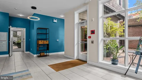 a view of a chairs and table in the patio