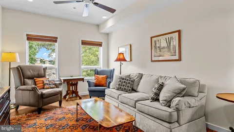 a kitchen with stainless steel appliances granite countertop a refrigerator stove microwave and sink