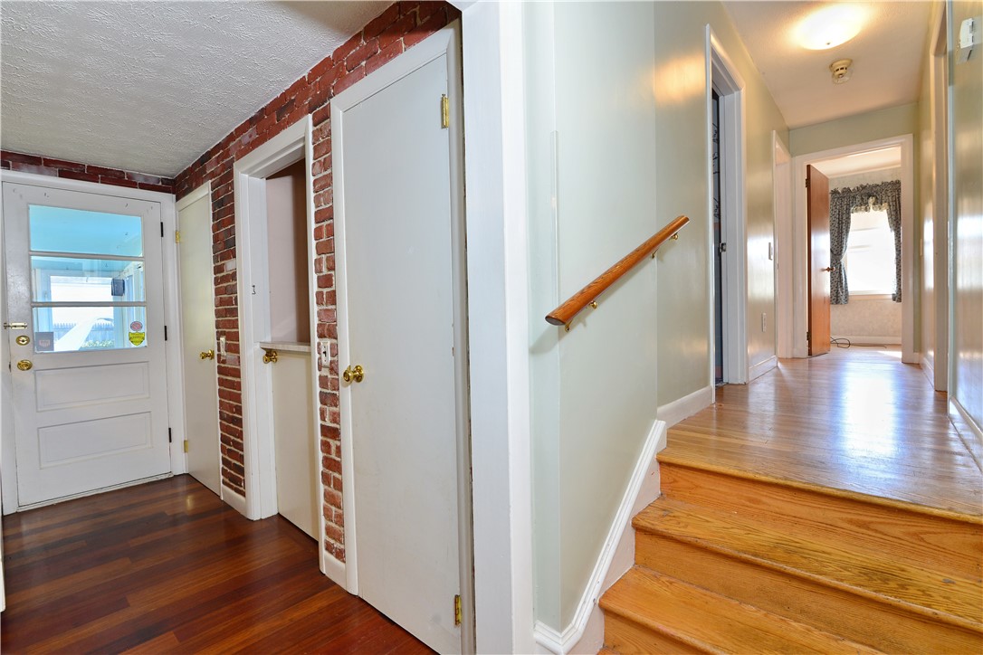 28 Oberlin Drive Warwick, RI 02886 - Photo 20 of 41 Kitchen/ stairs to bedrooms.