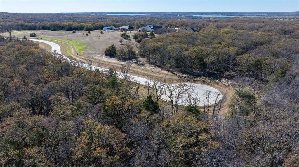 26 Shady Oak Ln Valley View Valley View, TX 76272 - Photo 7 of 14 a view of a lake in middle of the town