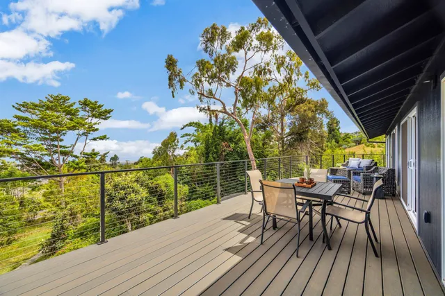 a view of a chairs and table on the wooden floor