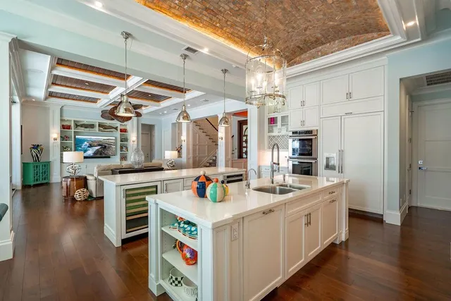 a view of swimming pool with a table and chairs