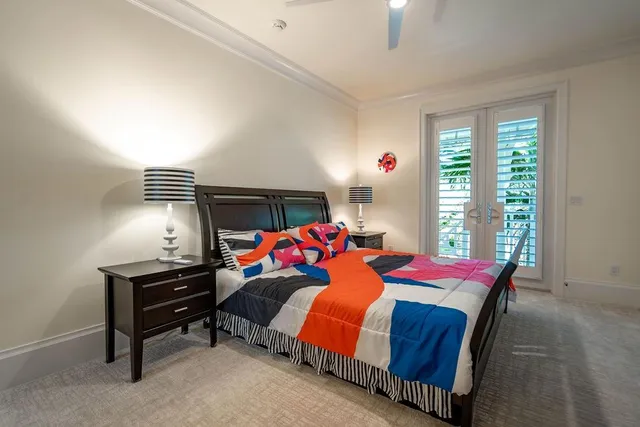 a view of a swimming pool with a table and chairs