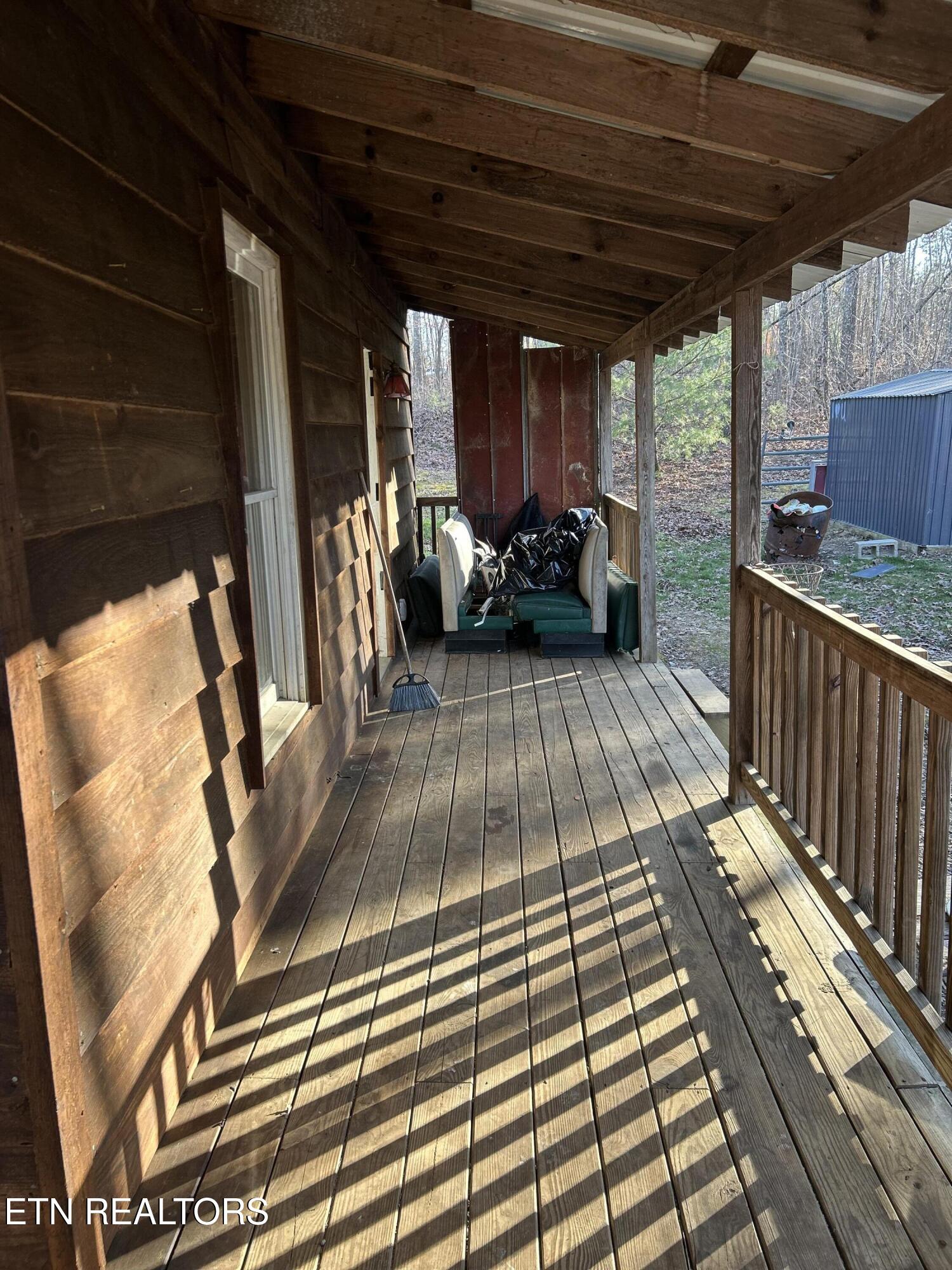 346 Scott Wyatt Road Deer Lodge, TN 37726 - Photo 7 of 29 346 scott wyatt- side porch