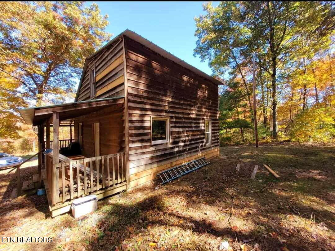346 Scott Wyatt Road Deer Lodge, TN 37726 - Photo 9 of 29 346 Scott Wyatt exterior porch side view