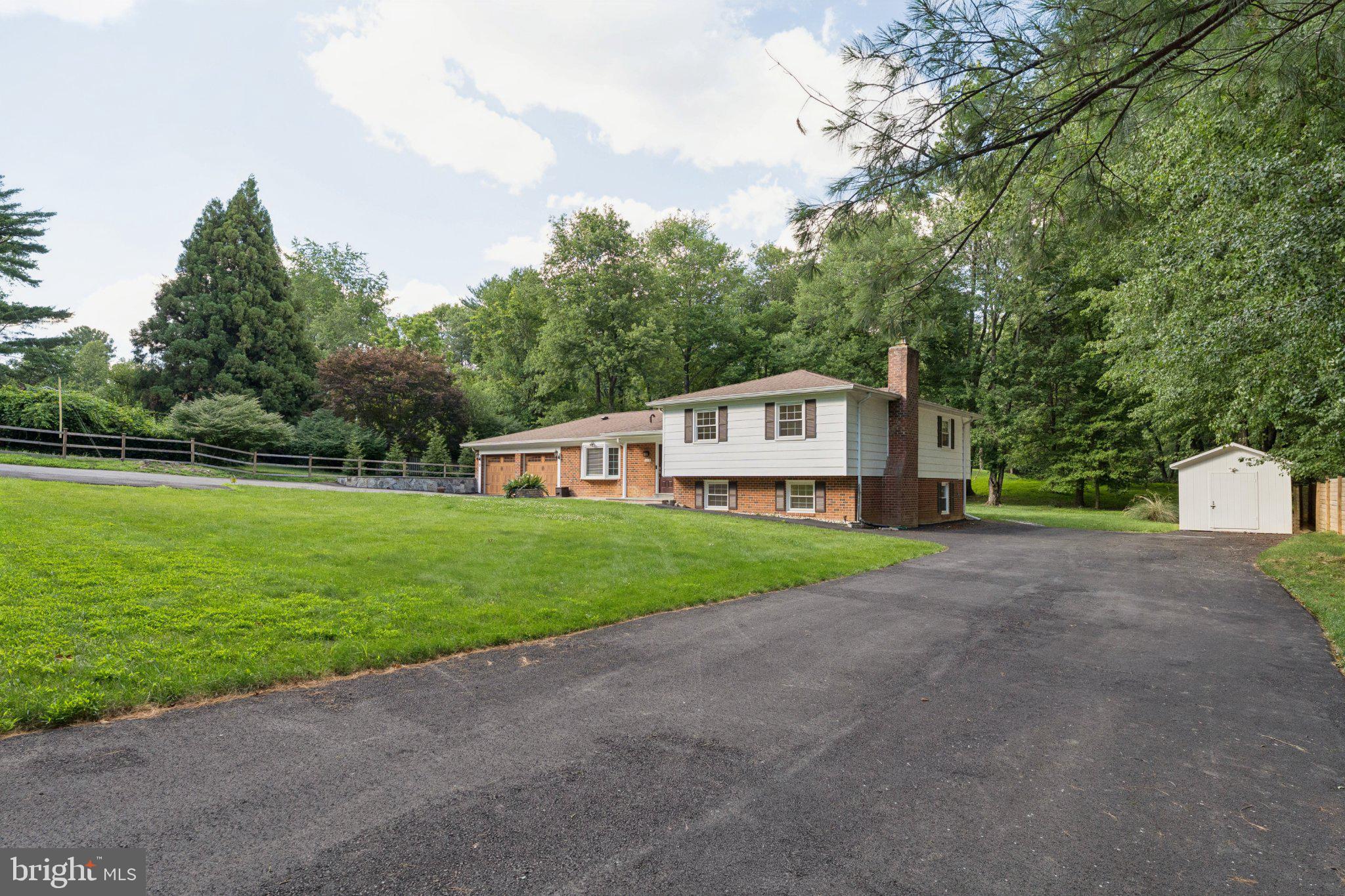 3219 Fox Mill Road Oakton, VA 22124 - Photo 4 of 87 Charming home nestled in lush greenery.