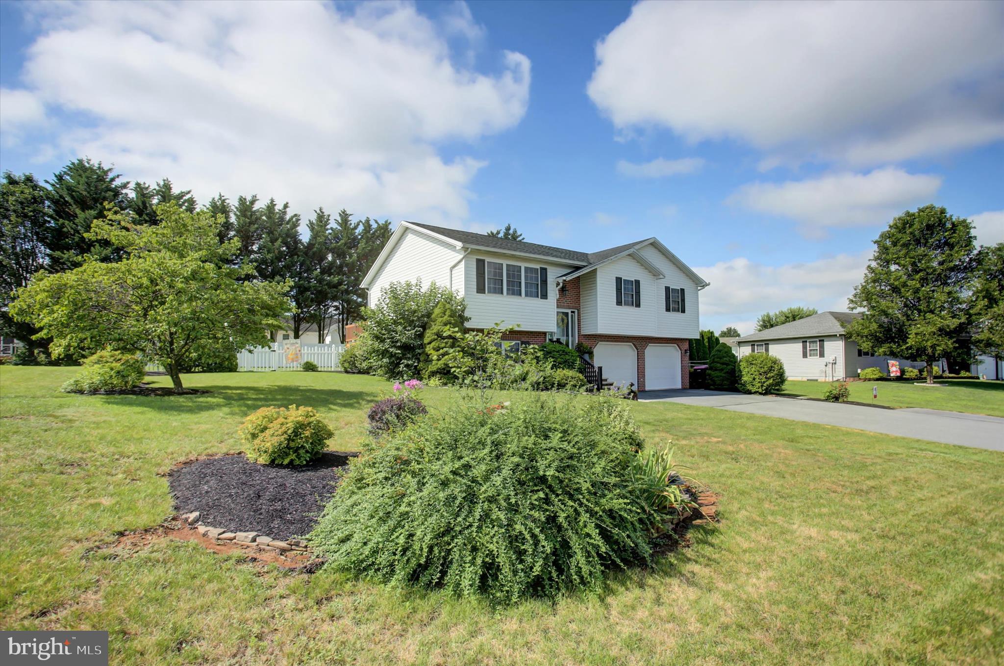 10482 Mapleton Road Shippensburg, PA 17257 - Photo 3 of 40 a front view of a house with a yard