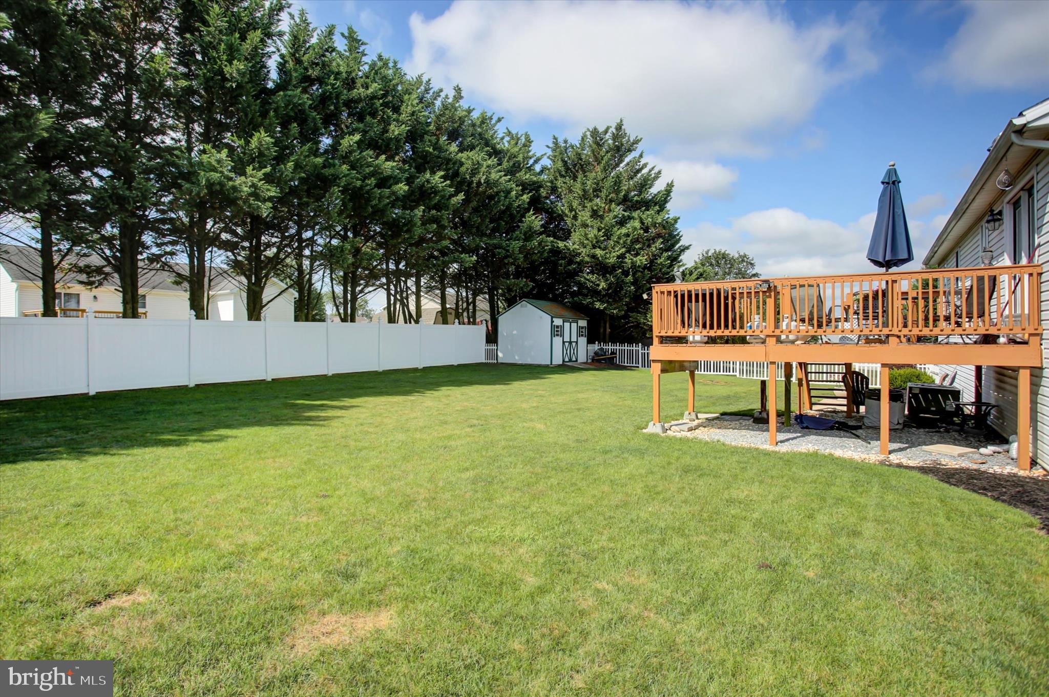 10482 Mapleton Road Shippensburg, PA 17257 - Photo 34 of 40 a view of a house with a big yard and sitting area