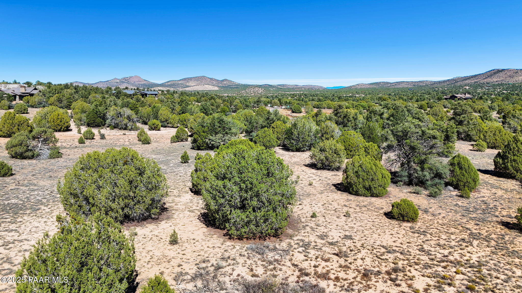15654 North Double Adobe Road Prescott, AZ 86305 - Photo 13 of 35 a view of a garden with mountains in the background