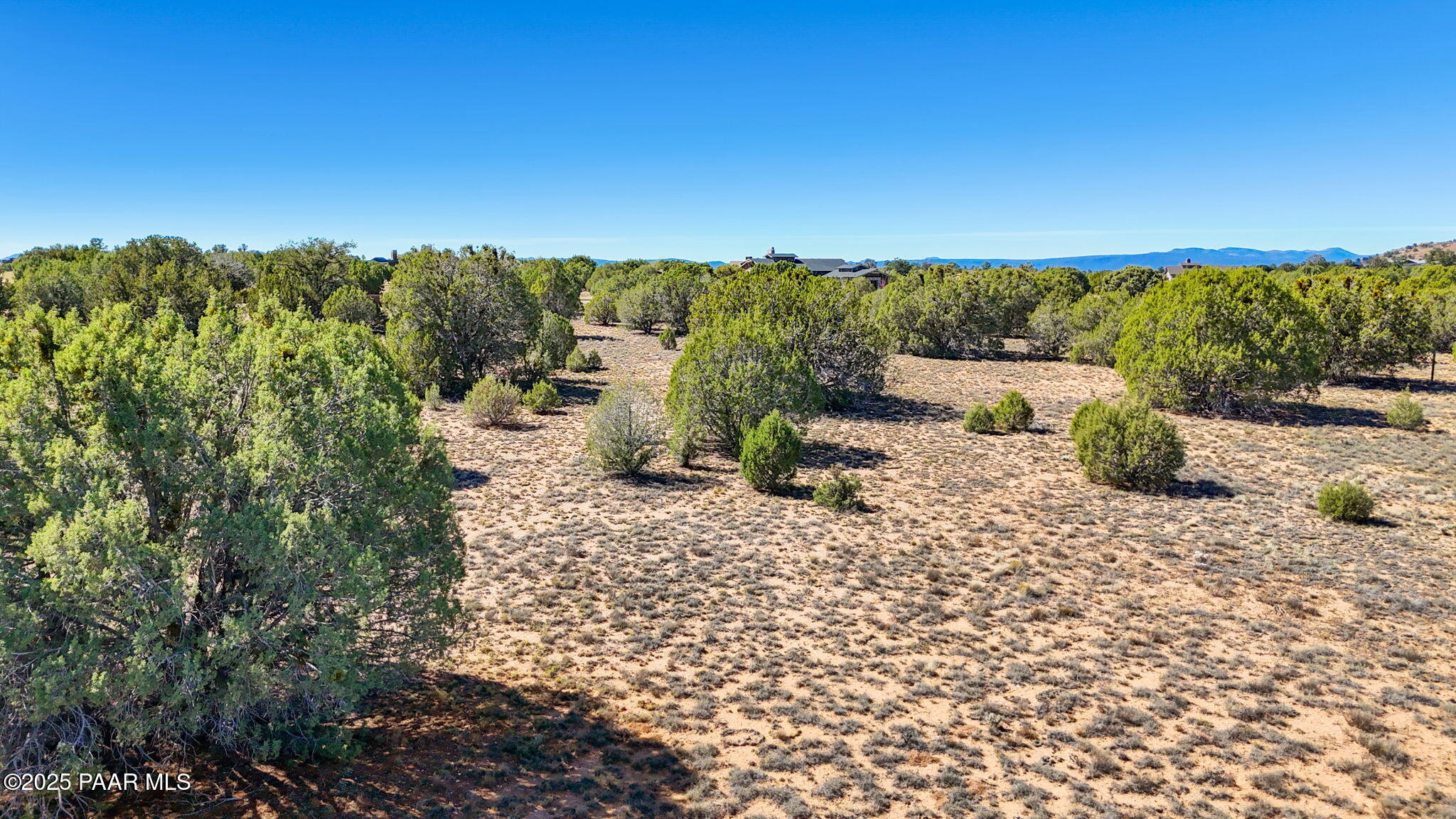 15654 North Double Adobe Road Prescott, AZ 86305 - Photo 15 of 35 a view of a terrace with a garden