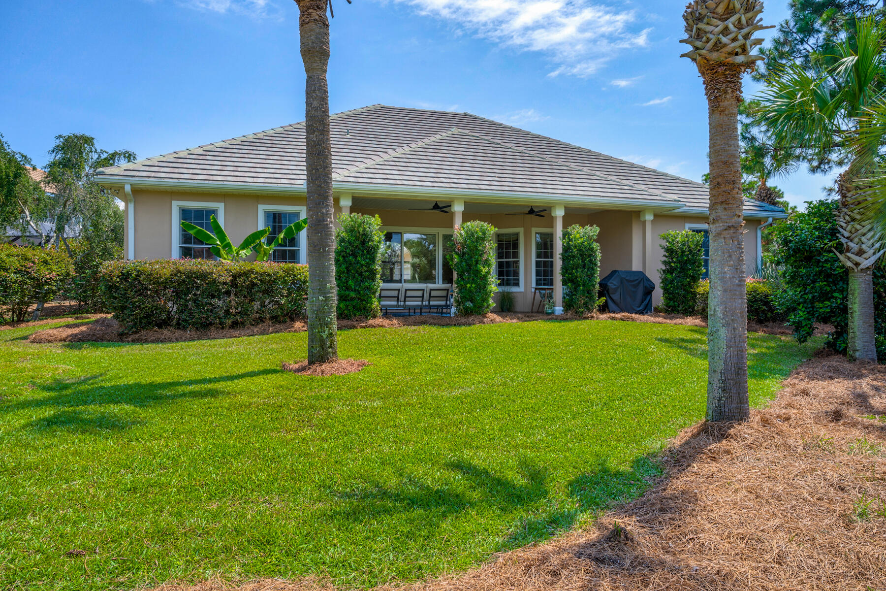 116 Tranquility Lane Destin, FL 32541 - Photo 27 of 27 a view of a house with a yard and porch
