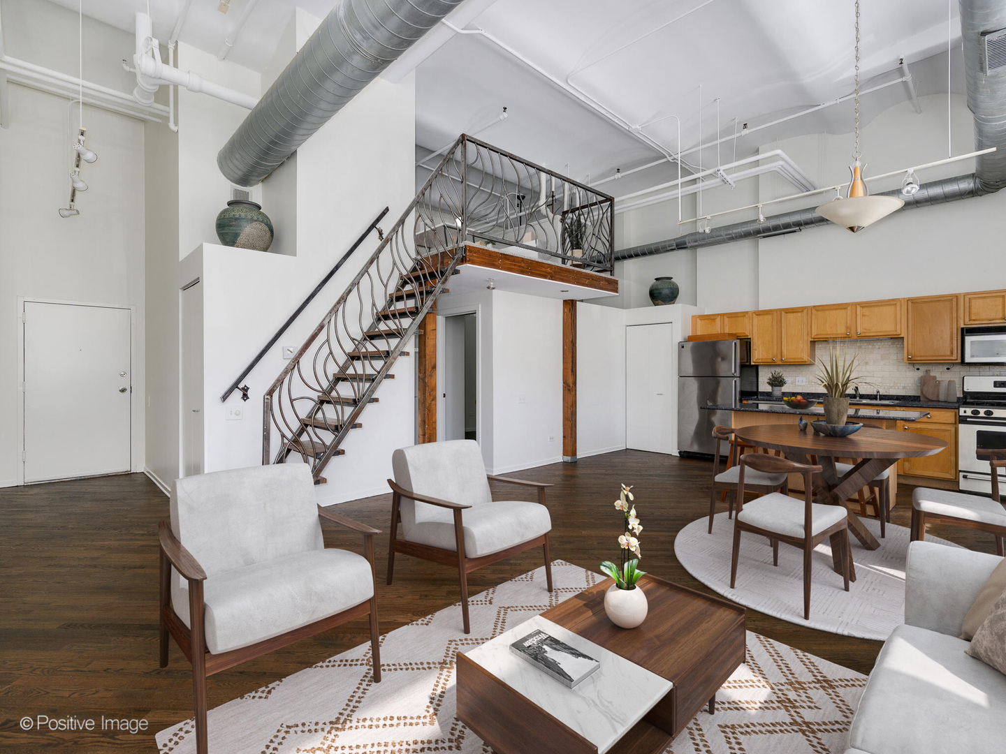 500 South Clinton Street, Unit 110 Chicago, IL 60607 - Photo 4 of 16 a living room with furniture and wooden floor