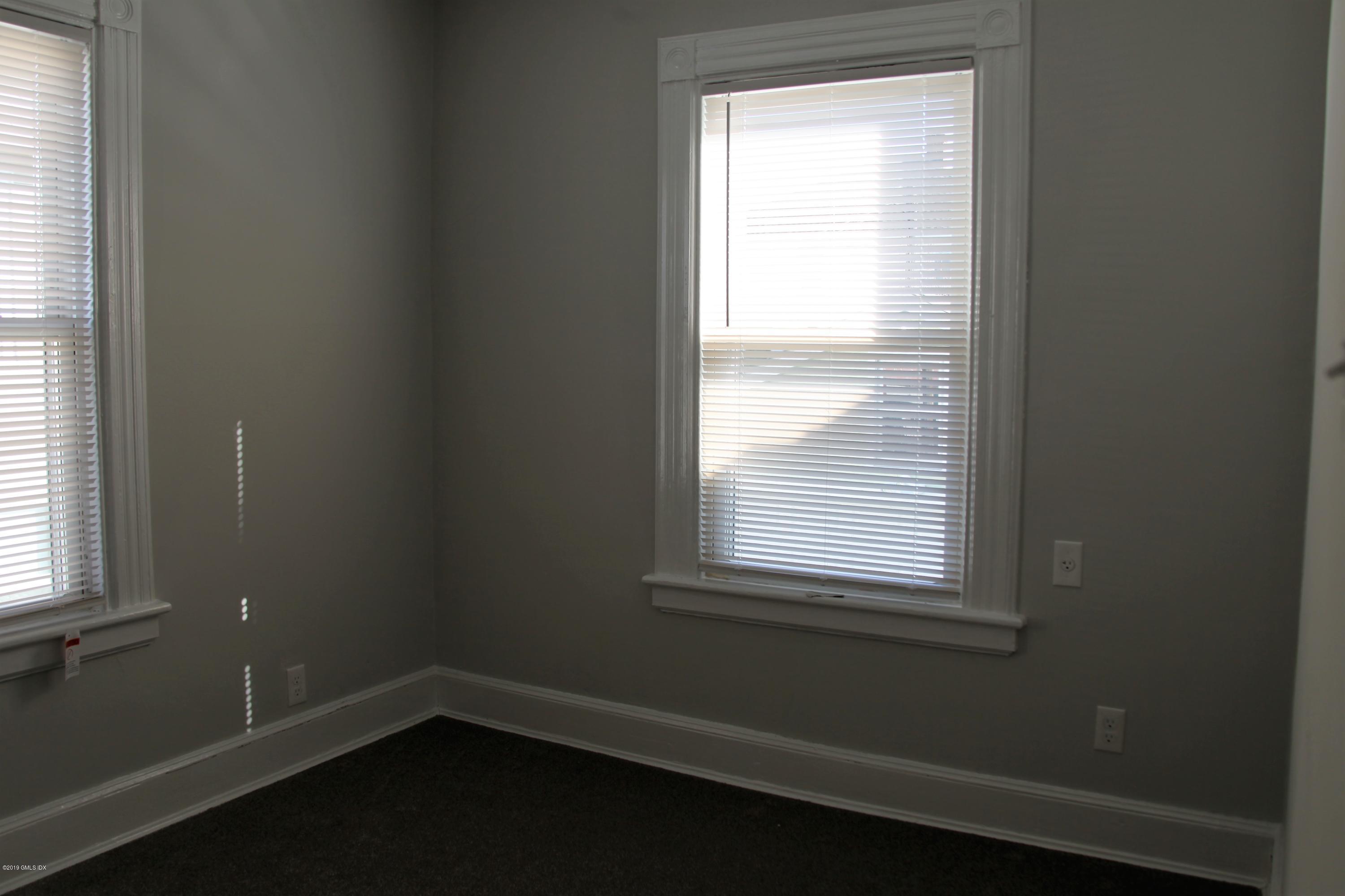 173 Hamilton Avenue Greenwich, CT 06830 - Photo 8 of 12 a small space with a window