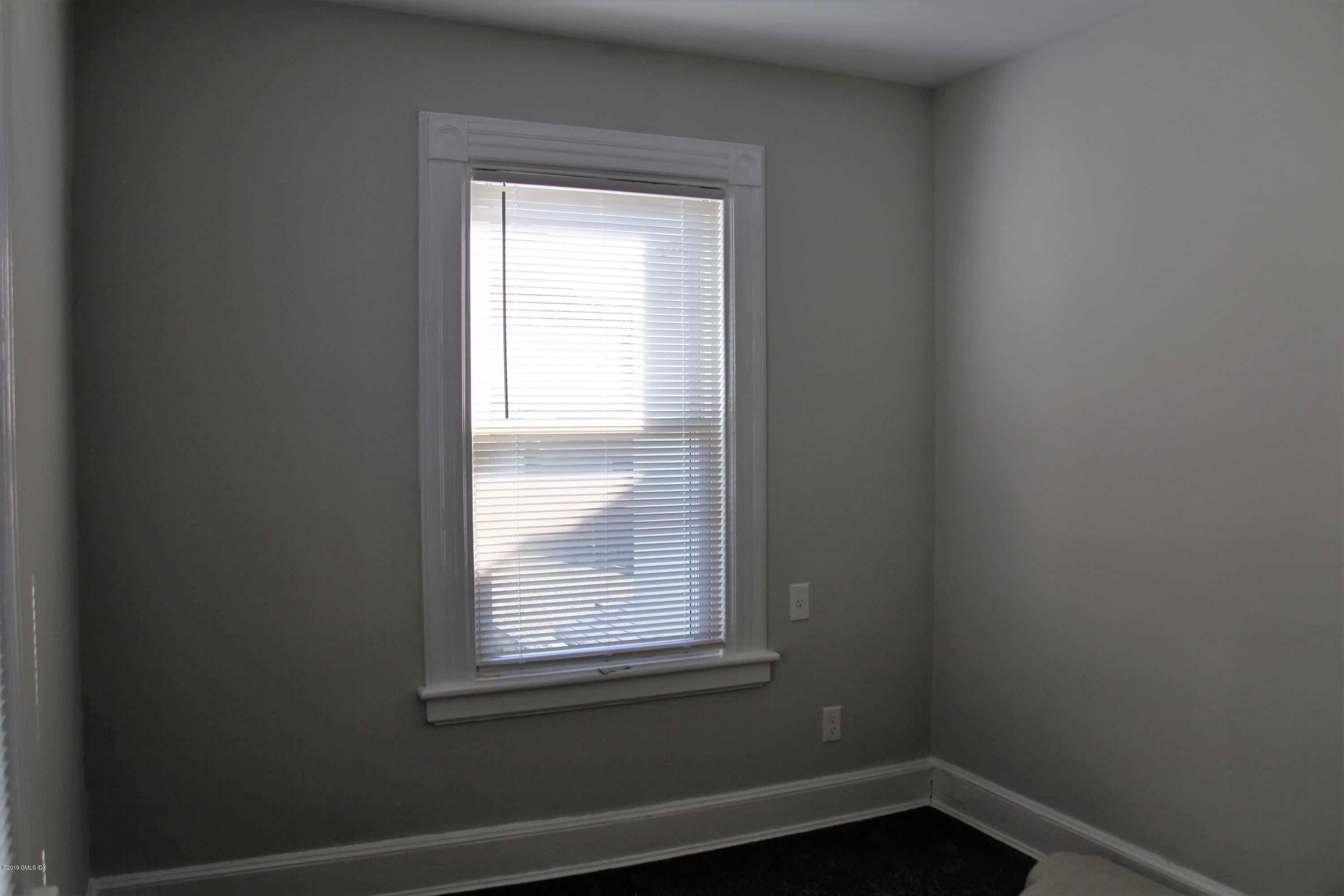 173 Hamilton Avenue Greenwich, CT 06830 - Photo 9 of 12 a small space with a window
