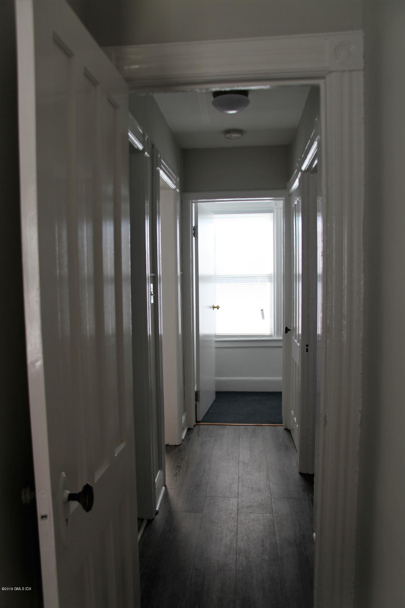 173 Hamilton Avenue Greenwich, CT 06830 - Photo 10 of 12 a view of entryway with window